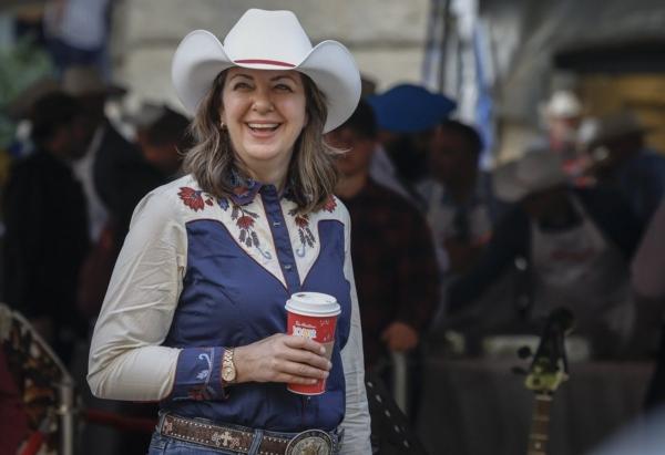 Alberta Premier Danielle Smith attends her Stampede pancake breakfast in Calgary on July 10, 2023. (The Canadian Press/Jeff McIntosh)