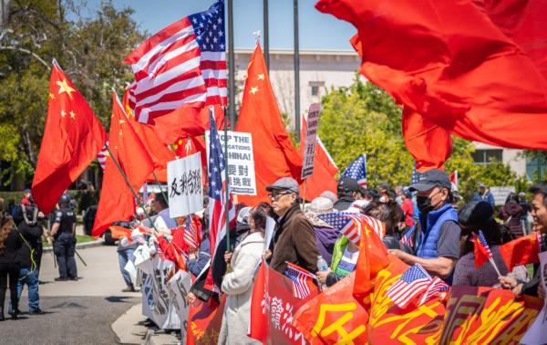 Pro-China supporters protest the arrival of Taiwan President Tsai Ing-wen at the Ronald Reagan Presidential Library in Semi Valley, Calif., on April 5, 2023. (John Fredricks/The Epoch Times)