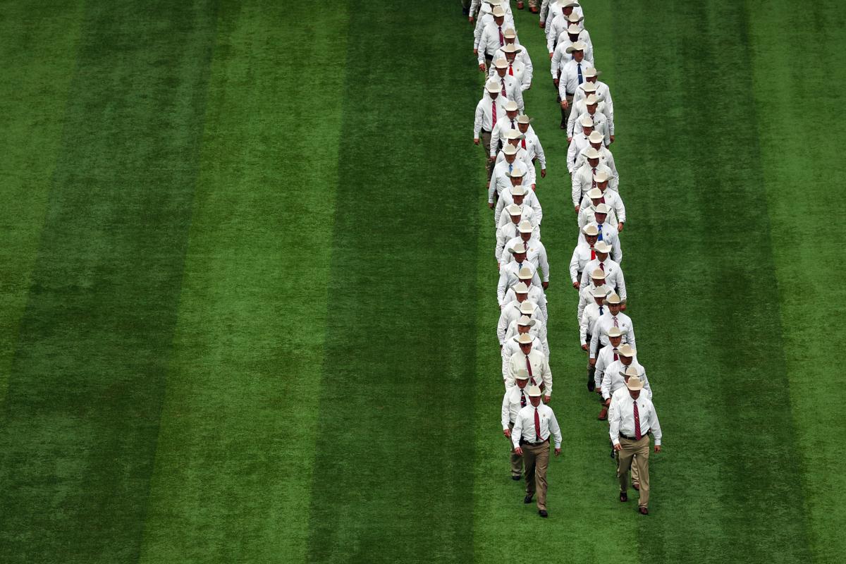 Members of The Texas Rangers division within the Texas Department of Public Safety take the field before the pregame ceremonies before the Opening Day game between the Philadelphia Phillies and the Texas Rangers at Globe Life Field in Arlington, Texas on March 30, 2023. (Richard Rodriguez/Getty Images)<span style="font-size: 16px;"> </span>