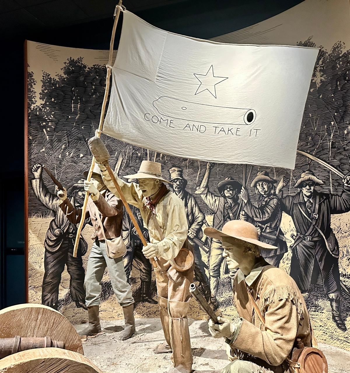 A diorama illustrates an 1835 scene from the Battle of Gonzales, the first military engagement of the Texas Revolution, at the Bullock Texas State History Museum in Austin on Jan. 24, 2023. (Darlene McCormick Sanchez/The Epoch Times)