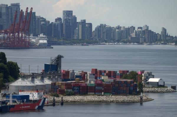 Stacks of cargo containers are seen at port during a strike by International Longshore and Warehouse Union Canada workers in the province, in Vancouver, on July 12, 2023. (Darryl Dyck/The Canadian Press)