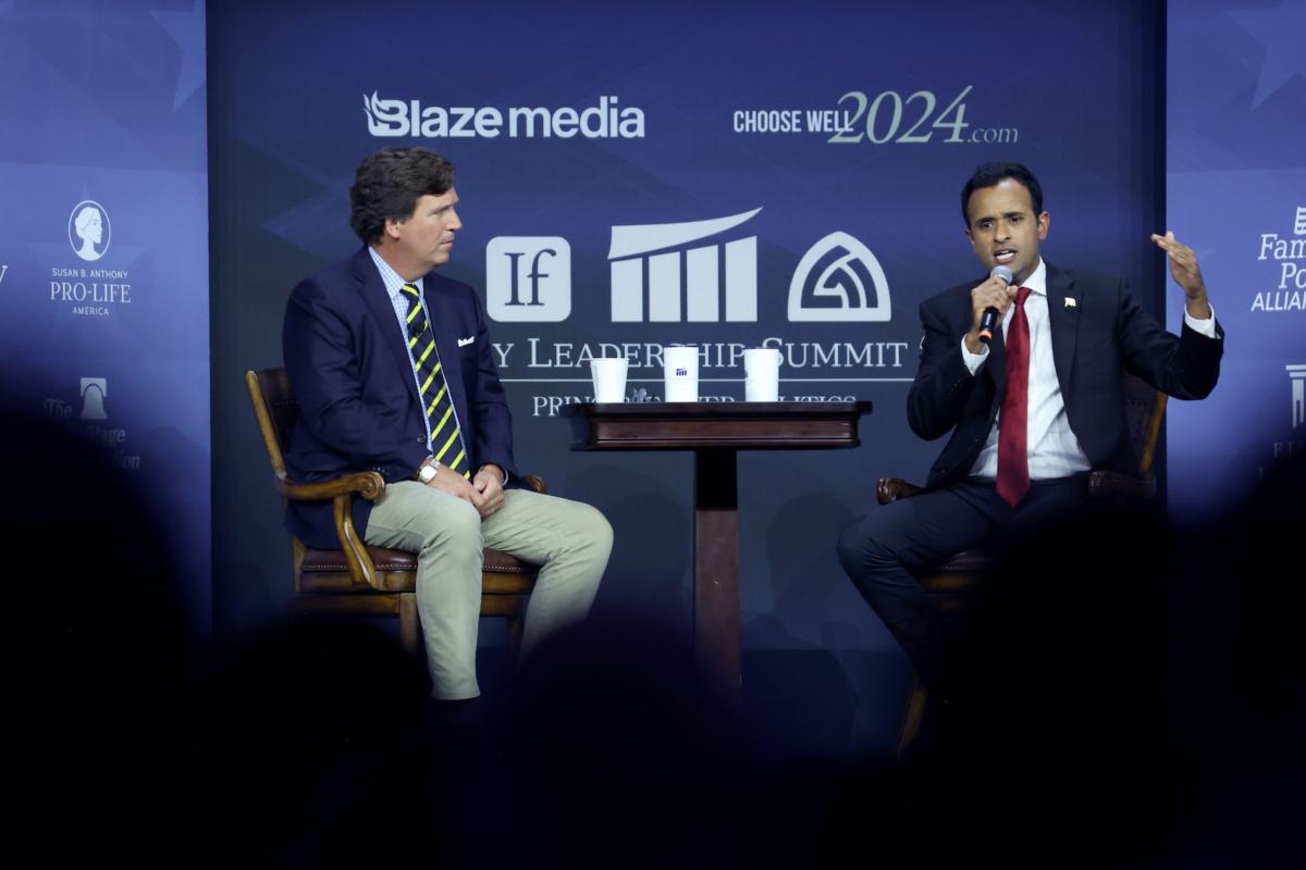 Republican presidential candidate Vivek Ramaswamy fields questions from former Fox News host Tucker Carlson at the Family Leadership Summit in Des Moines, Iowa on July 14, 2023. (Scott Olson/Getty Images)
