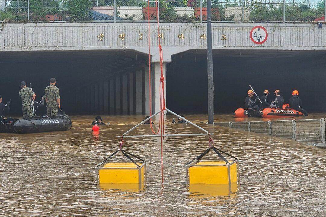 9 Bodies Pulled From a Flooded Road Tunnel in South Korea as Rains Cause Flash Floods and Landslides