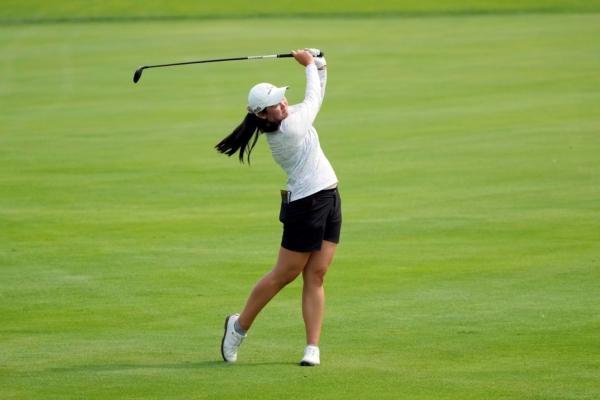 Allisen Corpuz hits her approach shot onto the 18th green during the final round of the Dana Open golf tournament at Highland Meadows Golf Club in Sylvania, Ohio on July 16, 2023. (Carlos Osorio/AP Photo)