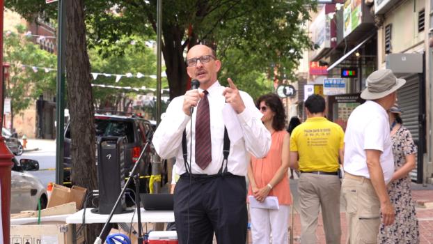 Dr. Mark Thomas, chair of the political science department at La Salle University, spoke at the Philadelphia Chinatown rally on July 15, to call to end the persecution of Falun Gong in China. (William Huang/The Epoch Times)