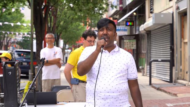 Aaron Bashir, candidate for Philadelphia City Controller, spoke at the Philadelphia Chinatown rally on July 15, to call to end the persecution of Falun Gong in China. (William Huang/The Epoch Times)