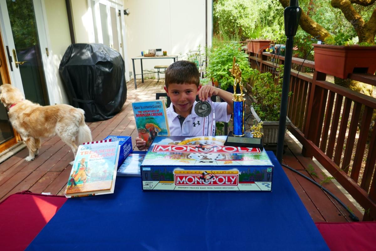 H.N. displays his favorite things in the backyard of his home in Scotts Valley, Calif., on July 16,2023. (Steve Ispas/The Epoch Times)