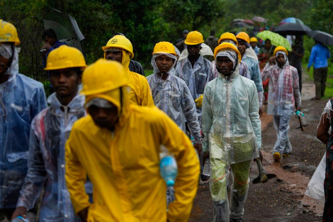 Indian Rescuers Recover 27 Dead but No Sign of Dozens of Missing Villagers Swamped by Landslide