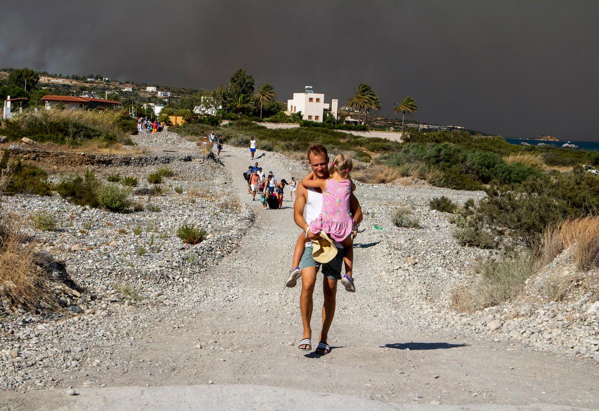 Tourists Flee Wildfires on Greek Island of Rhodes