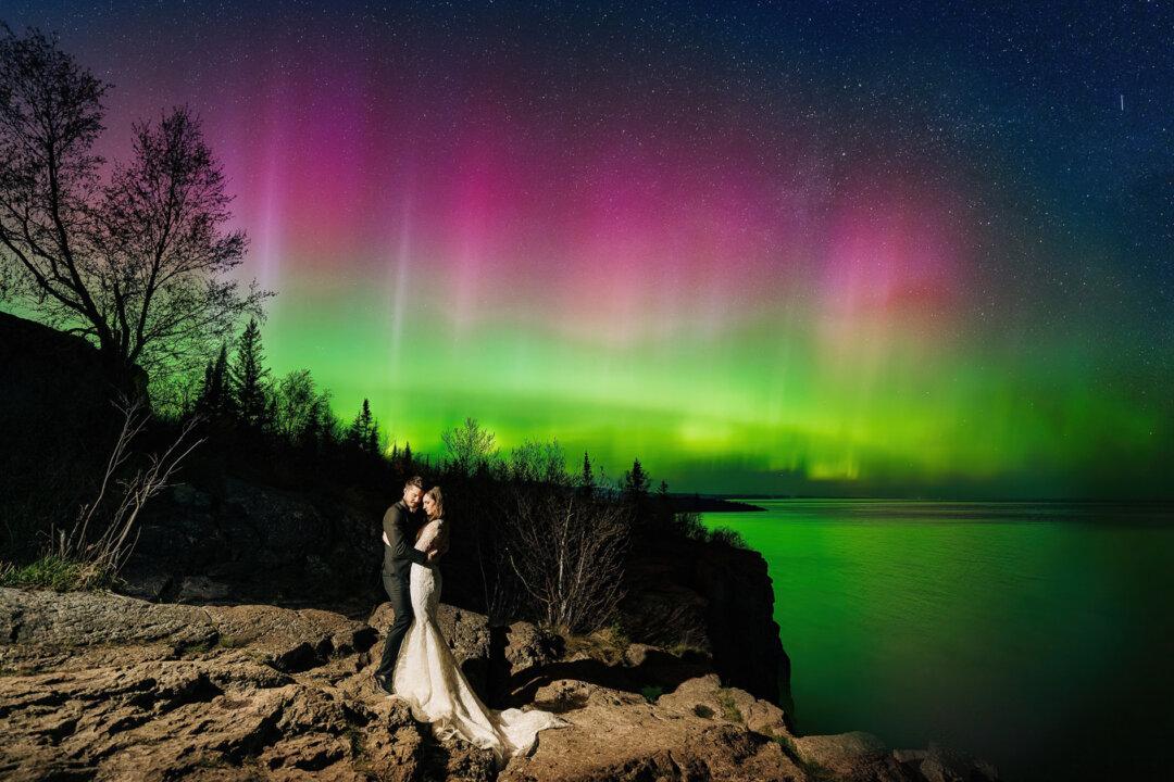 Minnesota Couple Gets ‘Super Lucky’ With Their Once-in-a-Lifetime Wedding Photo Under the Northern Lights