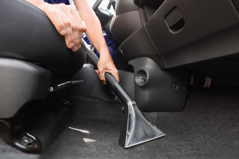 Vacuuming dirt, dust, and debris helps keep the carpeting in great condition; get all the other nooks & crannies, too. (New Africa/Shutterstock)