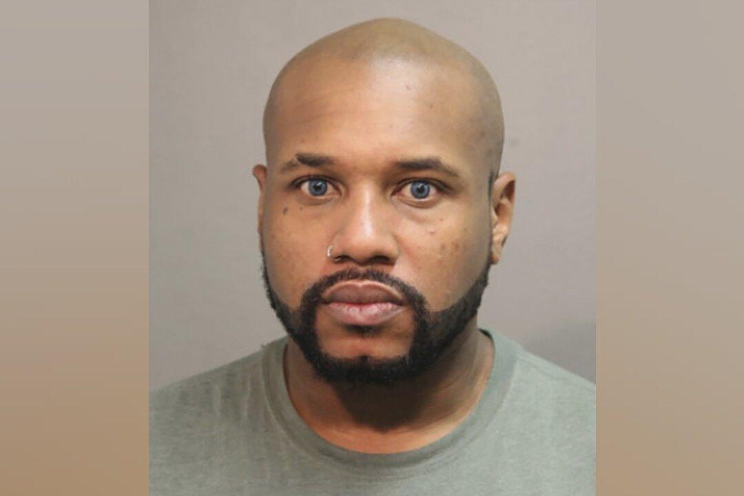 Police Searching Apartment of Chicago Man Charged in Man’s Killing Find Woman Dead in Refrigerator