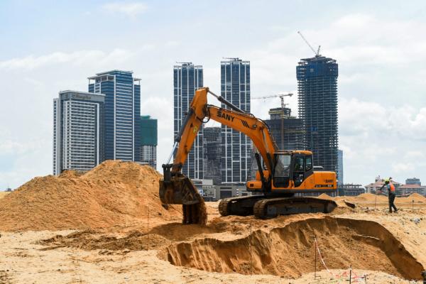 Workers work at the construction site as part of a China-funded project for Port City in Colombo, Sri Lanka, on Nov. 8, 2019. (Ishara S. Kodikara/AFP via Getty Images)