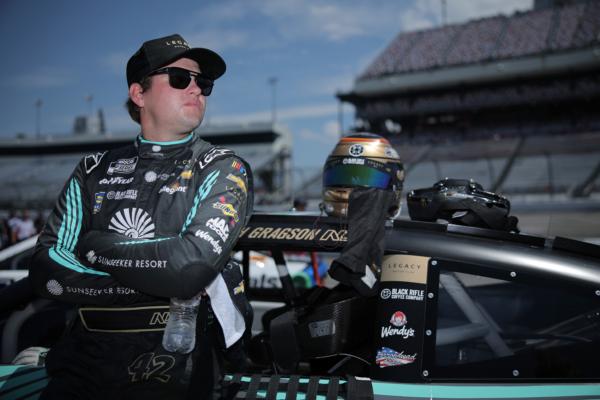 Noah Gragson, driver of the #42 Sunseeker Resort Chevrolet, waits on the grid during qualifying for the NASCAR Cup Series Cook Out 400 at Richmond Raceway in Richmond, Va., on July 29, 2023. (Jonathan Bachman/Getty Images)