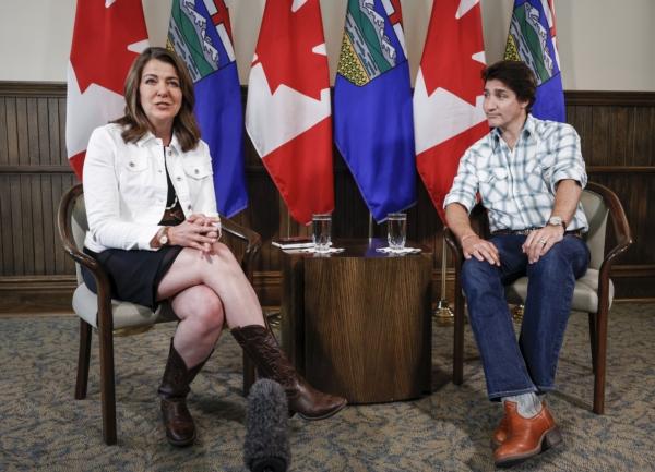 Prime Minister Justin Trudeau and Alberta Premier Danielle Smith meet in Calgary on July 7, 2023. (The Canadian Press/Jeff McIntosh)