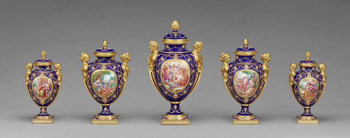 "Five Lidded Vases," 1781, by Sèvres Porcelain Manufactory. Soft-paste porcelain. Three central vases from the J. Paul Getty Museum, Los Angeles, and two end vases from The Walters Art Museum, Baltimore. (Courtesy of J. Paul Getty Museum)
