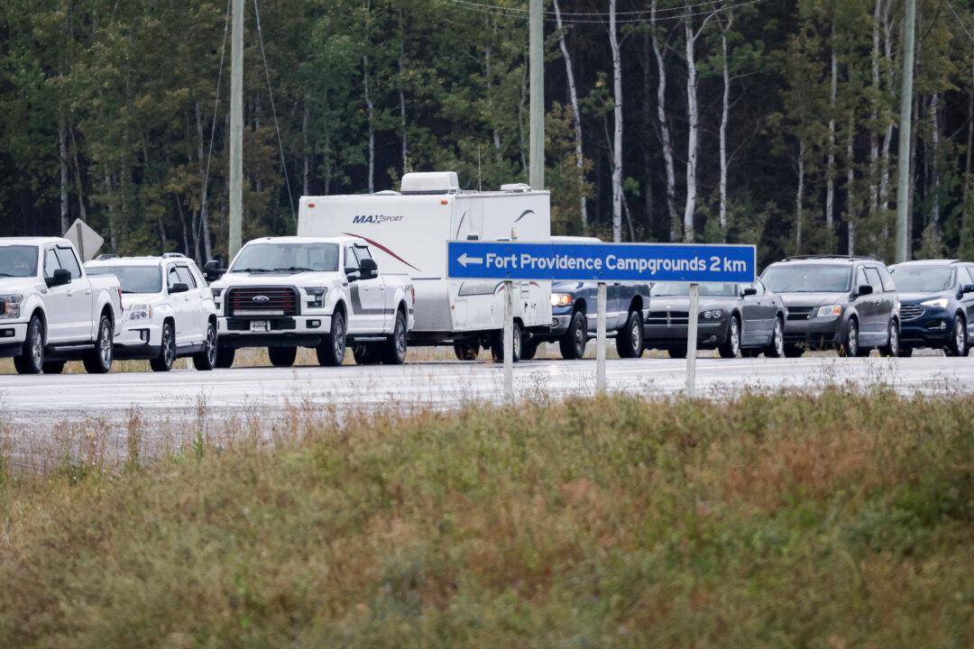 Thousands Evacuated as Wildfires Approach Yellowknife and West Kelowna