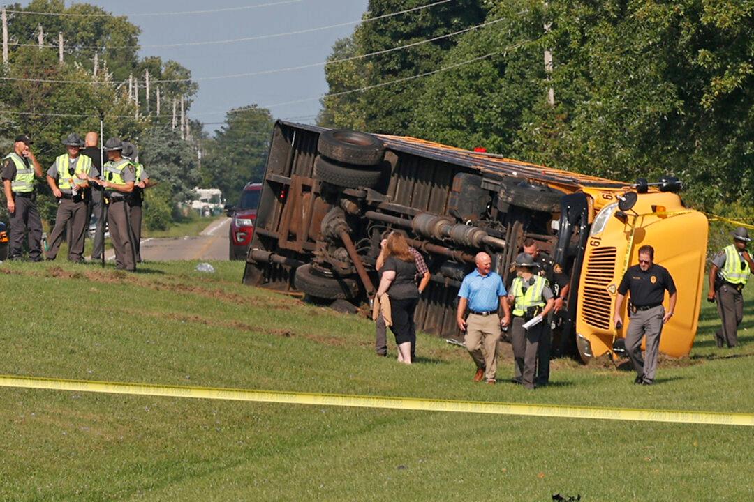 Ohio School Bus Overturns After Crash With Minivan, Leaving One Child Dead and 23 Injured