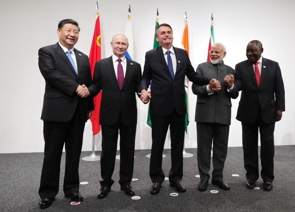 Chinese leader Xi Jinping, Russian President Vladimir Putin, Brazilian President Jair Bolsonaro, Indian Prime Minister Narendra Modi, and South African President Cyril Ramaphosa at a BRICS meeting at the G20 summit in Osaka, Japan, on June 28, 2019. (Mikhail Klimentyev /AFP via Getty Images)