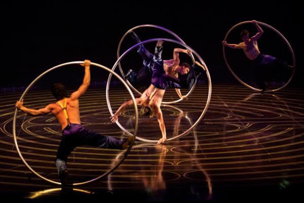 Giant rings circle at dizzying speeds in "Corteo." (Maja Prgomet/Cirque du Soleil 2023)
