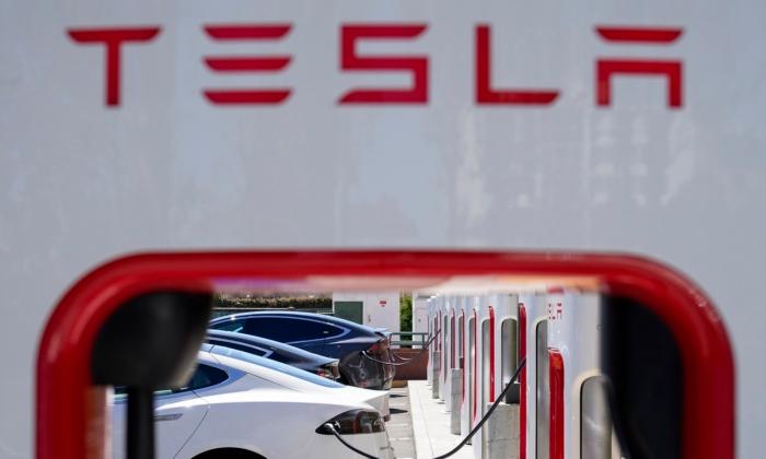 Tesla to Lay Off More Than 10 Percent of Its Global Workforce