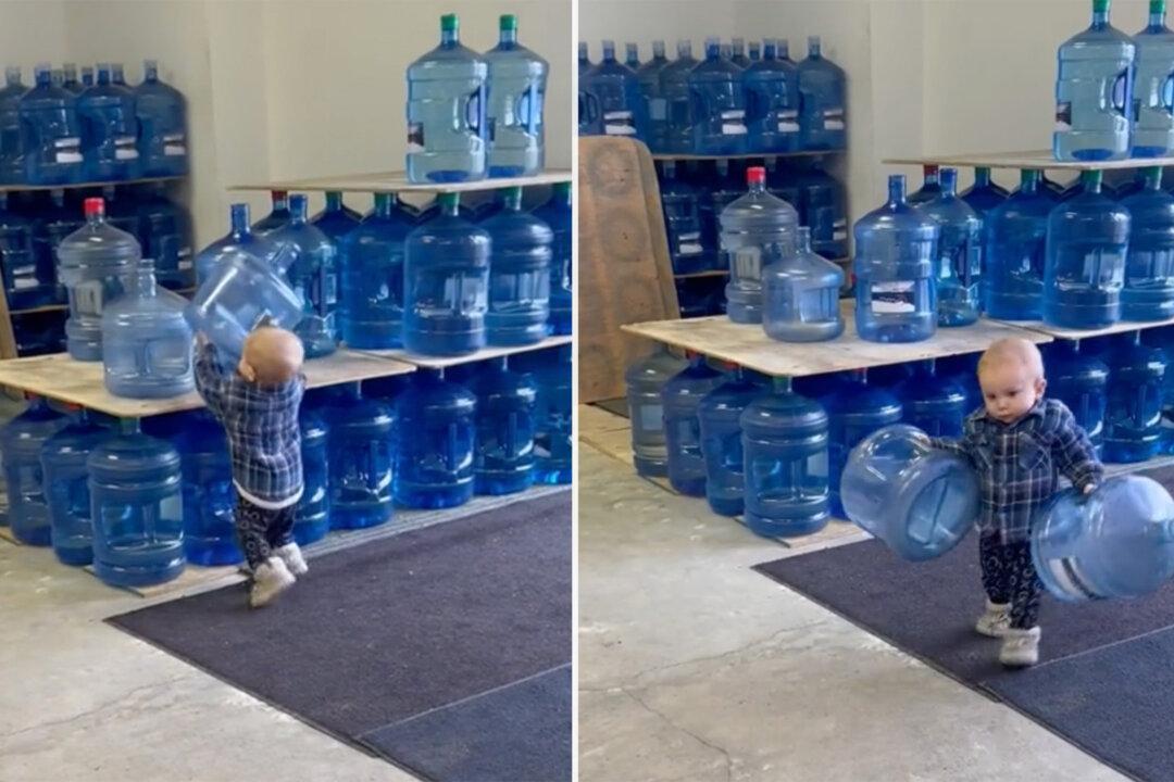 VIDEO: Adorable Toddler Helps Mom Unload Delivery Van by Carrying Empty Water Jugs