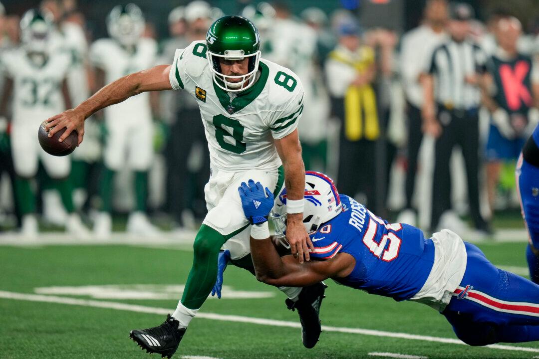 Jets Lose Aaron Rodgers to an Achilles Tendon Injury, Then Rally to Stun Bills 22–16 in Overtime