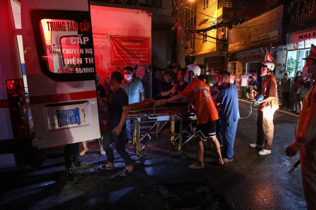 Fire at Vietnam Apartment Block Kills 56
