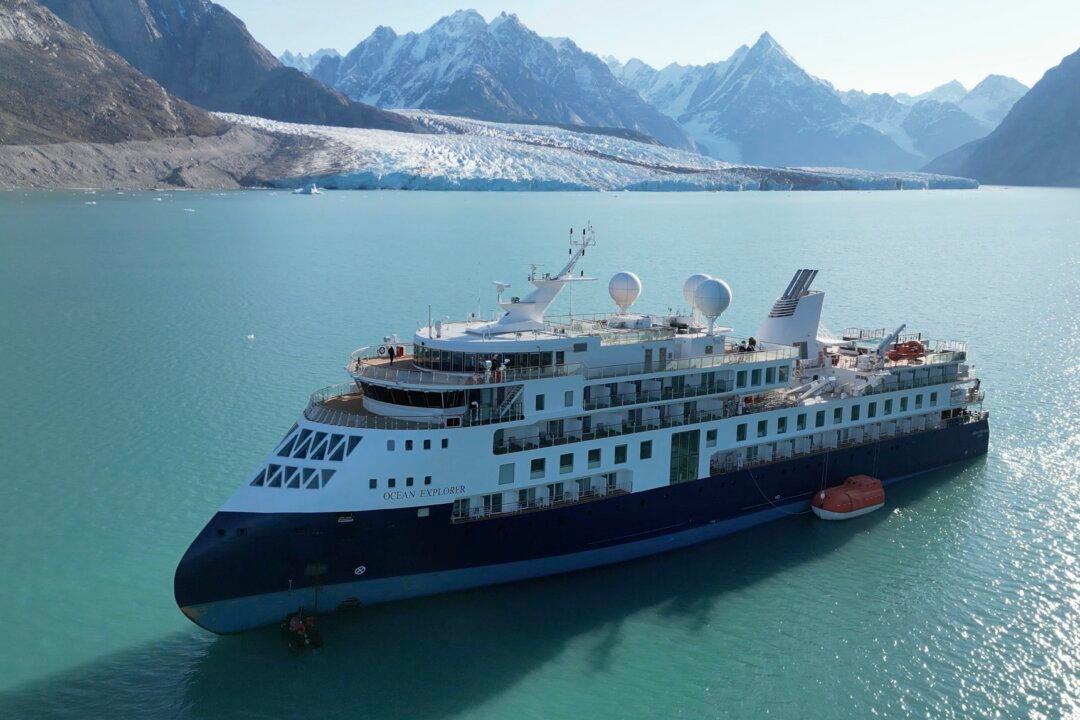 Stranded Luxury Cruise Ship MV Ocean Explorer Is Pulled Free at High Tide in Greenland