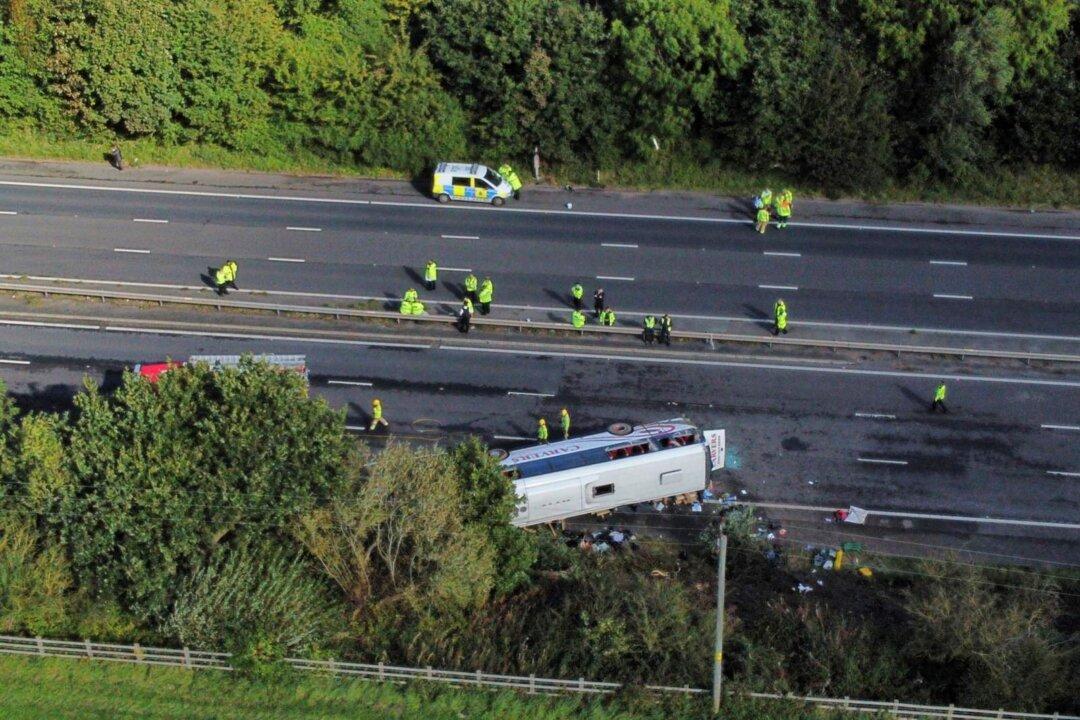 A Bus Carrying Children Overturns in Northwest England, Killing the Driver and a 14-Year-Old Girl