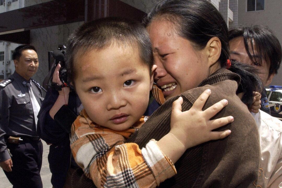 A Woman in China Sentenced to Death for Trafficking Children, Starting With Her Own