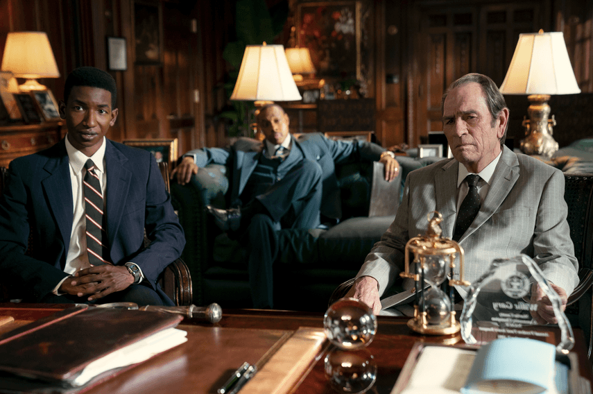 Hal Dockins (Mamoudou Athie, L) and Jerry O'Keefe (Tommy Lee Jones, R) at the law offices of Willie E. Gary, in "The Burial." (Amazon Prime Video)