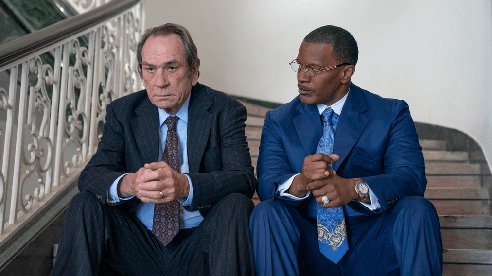 Jeremiah "Jerry" O’Keefe (Tommy Lee Jones, L) and Willie E. Gary (Jamie Foxx) contemplate $500 million, in "The Burial." (Amazon Prime Video)