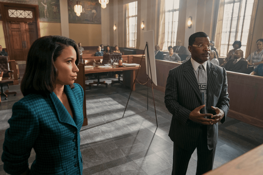 Mame Downes (Jurnee Smollett) and Willie E. Gary (Jamie Foxx), in "The Burial." (Amazon Prime Video)