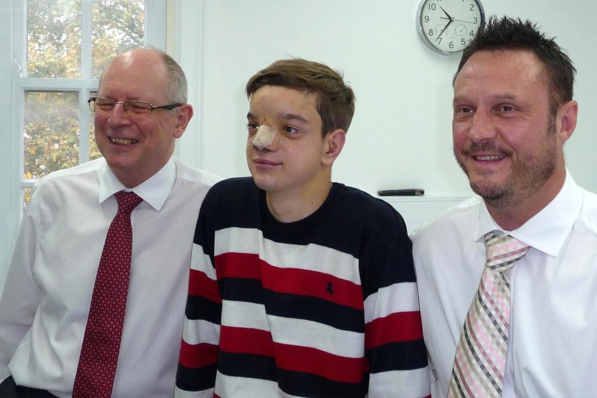 (Left) Surgeon David Dunaway, Stefan Savic, and Wayne Ingram after Stefan's final operation in 2016. (Courtesy of Wayne Ingram)