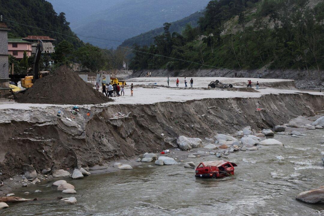 Indian Himalayan Flash Flooding Deaths Climb to 74; Scores Missing