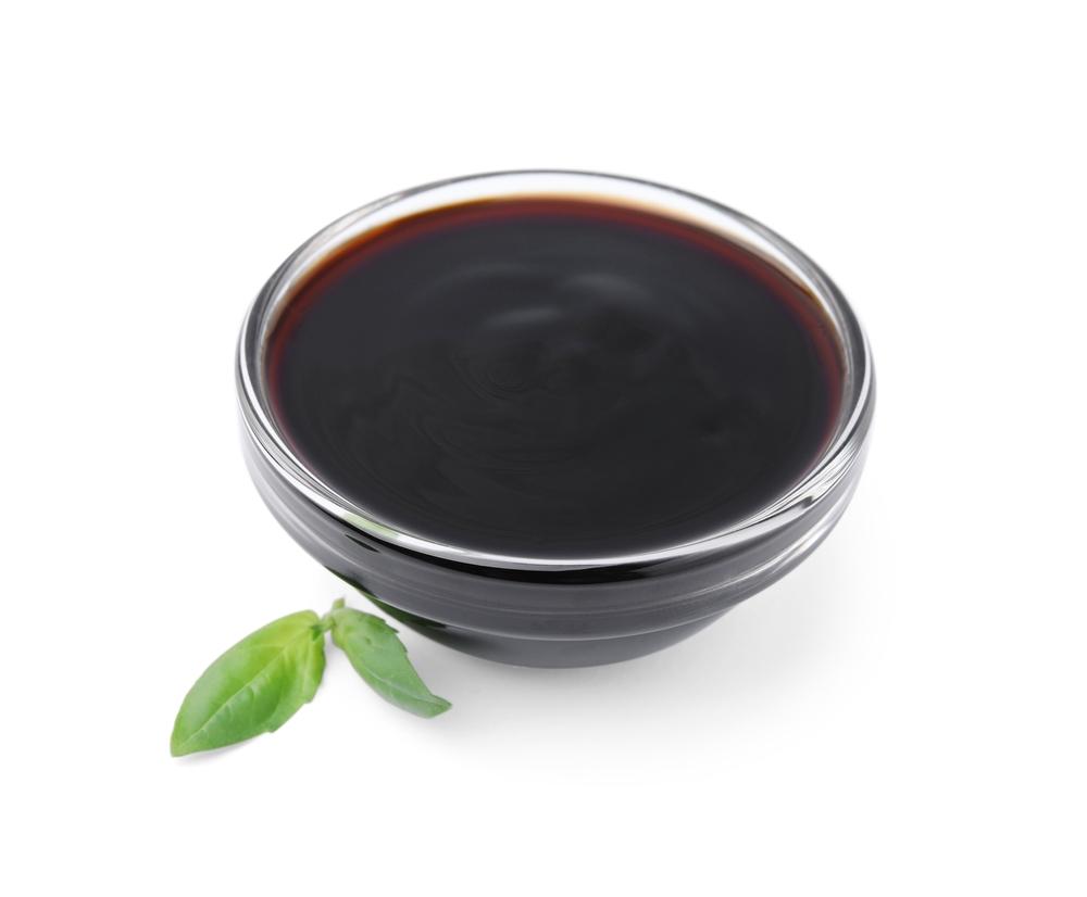 A puckery-sweet balsamic syrup finishes the vegetables, providing a shiny shellack and encouraging caramelization. (New Africa/Shutterstock)
