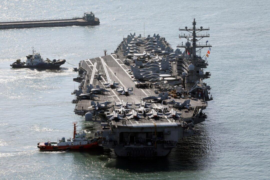 US Aircraft Carrier Arrives in South Korea as North’s Leader Kim Exchanges Messages With Putin
