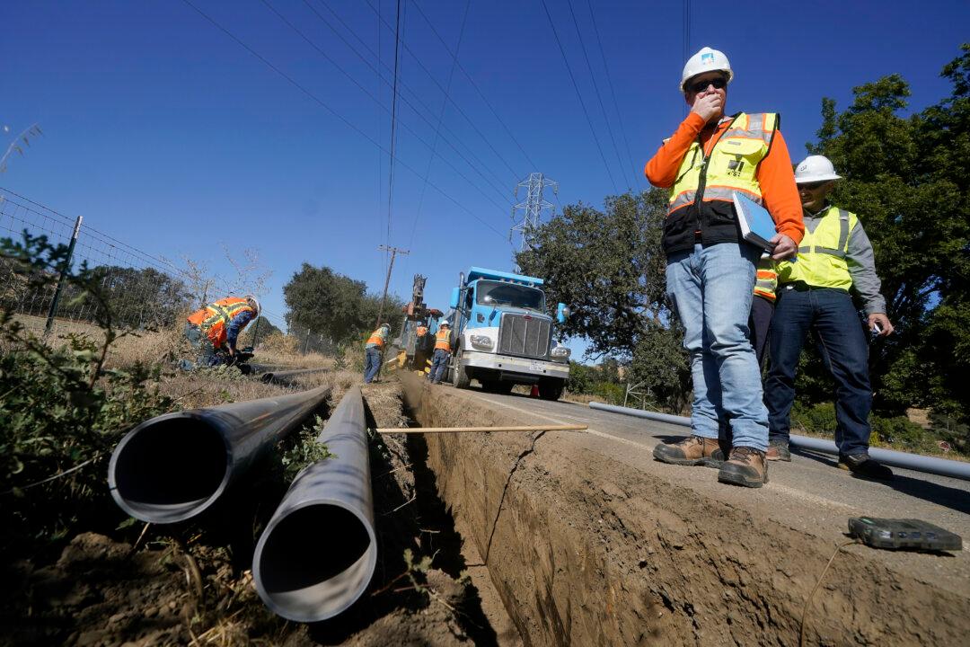PG&E’s Plan to Bury Power Lines, Prevent Wildfires Faces Opposition Due to High Rates