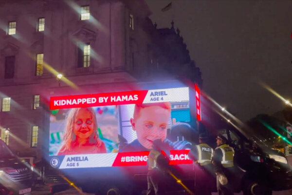 Screenshot taken with permission from a video posted on X by Campaign Against Antisemitism showing a billboard van displaying information of children taken hostage by the Hamas terrorist group, in central London on Oct. 18, 2023. (Campaign Against Antisemitism/Screenshot via The Epoch Times)