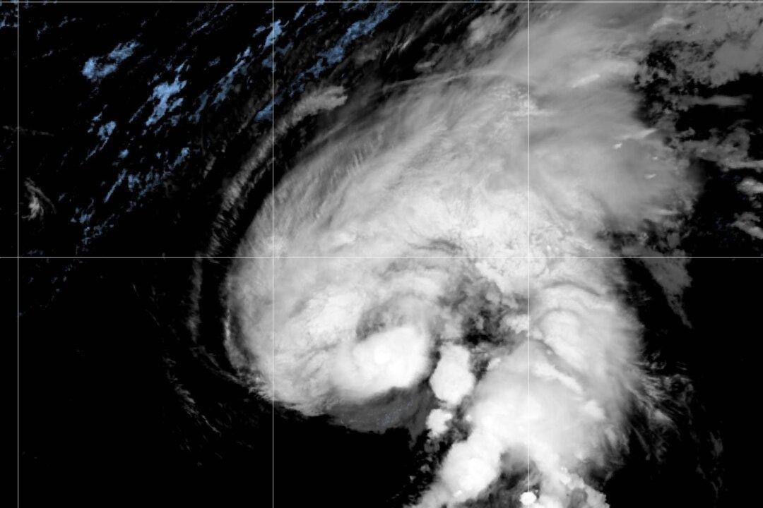 Heavy Rains Drench Northeast Caribbean as Hurricane Tammy Spins Into Open Waters