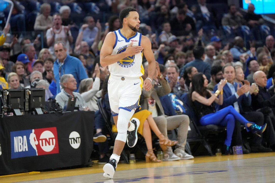 Booker, Durant Lead Suns Past Curry and Warriors 108–104 in Season Opener