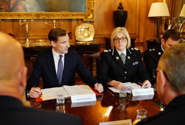 Crime and policing minister Chris Philp (2L) hosts senior figures in policing and 13 of the UK’s biggest retailers in Downing Street to set out a joint plan of action to tackle shoplifting, in London, on Oct. 23, 2023. (Aaron Chown - WPA Pool/Getty Images)