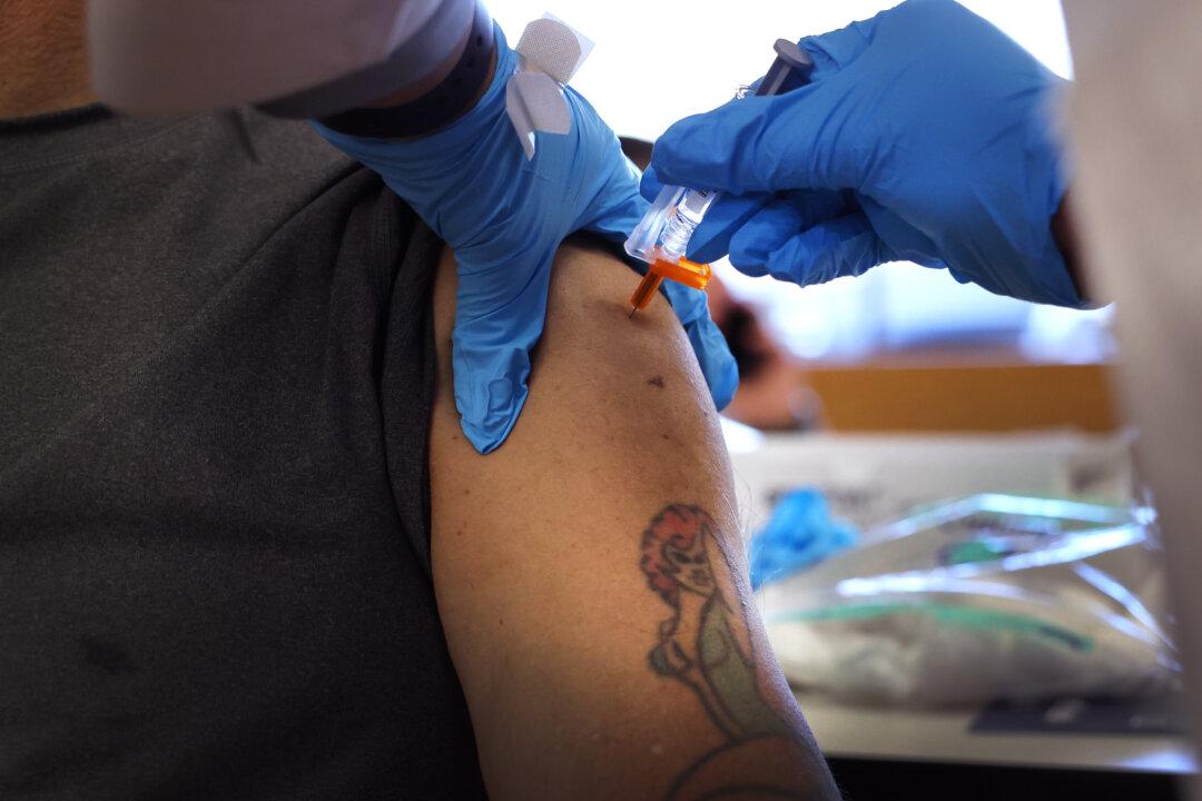 Hospital Worker Fired for Not Getting Mandated Influenza Vaccine Wins Payout