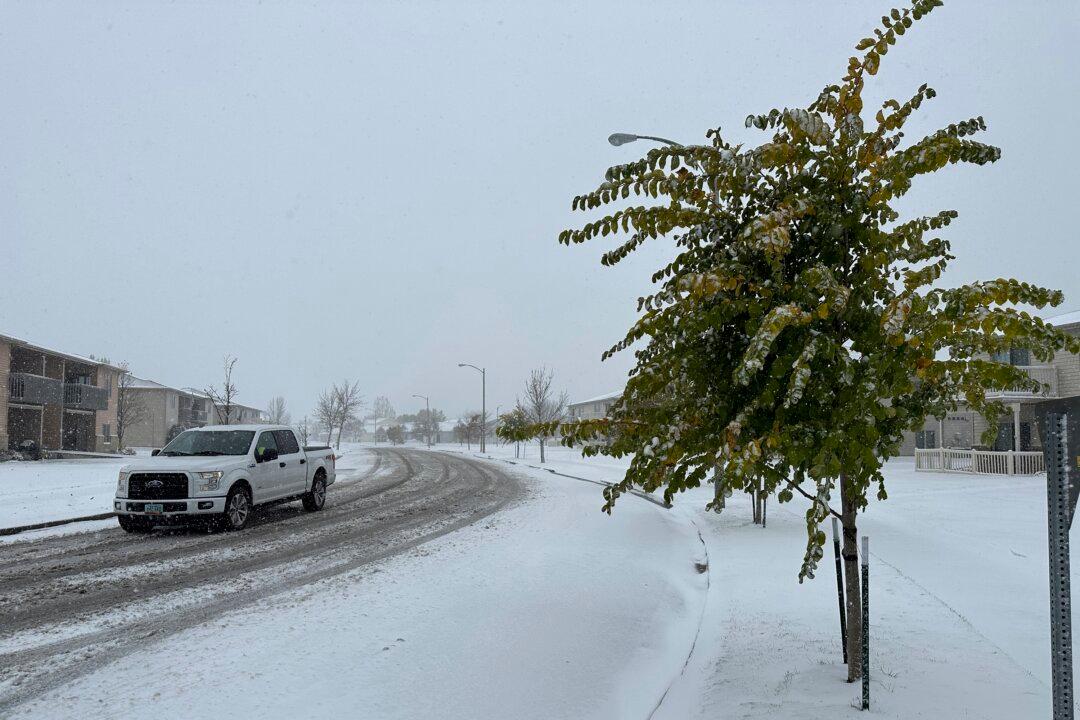 Snow Piles up in North Dakota as Region’s First Major Snowstorm of the Season Moves Eastward