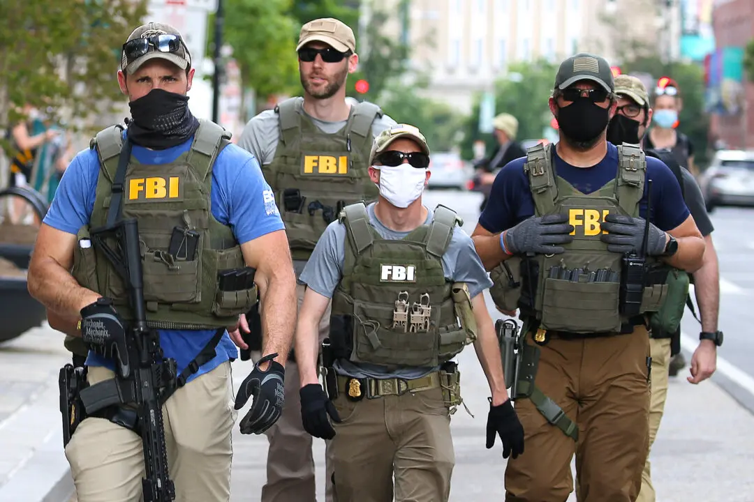 12 FBI Employees Fired for Kneeling at George Floyd Protest Sue to Get Their Jobs Back