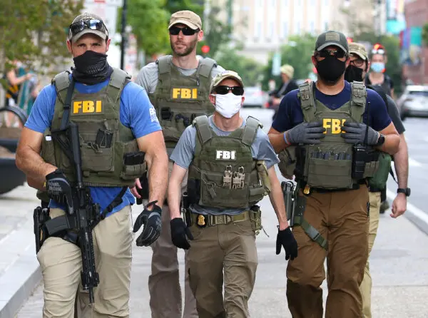 12 FBI Employees Fired for Kneeling at George Floyd Protest Sue to Get Their Jobs Back