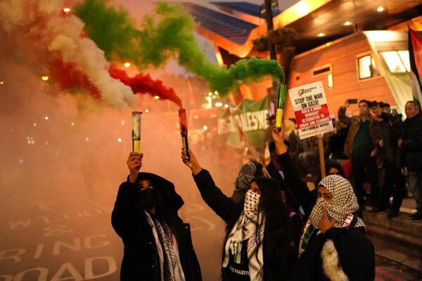 People during a pro-Palestinian protest in London, marching from Hyde Park to the U.S. embassy in Vauxhall, on Nov. 11, 2023. (Aaron Chown/PA)