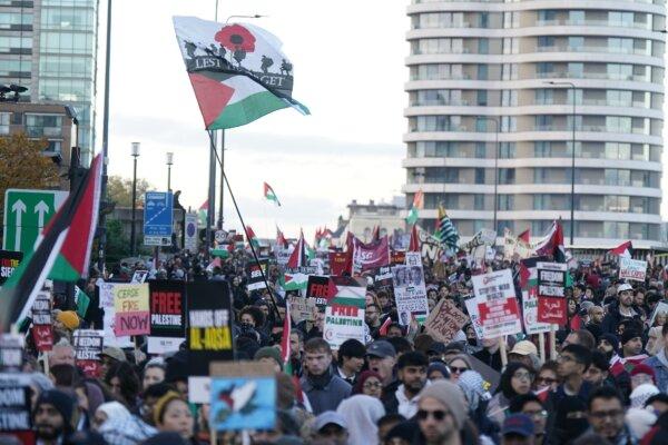 People during a pro-Palestinian protest in London, marching from Hyde Park to the U.S. embassy in Vauxhall, on Nov. 11, 2023. (Aaron Chown/PA)