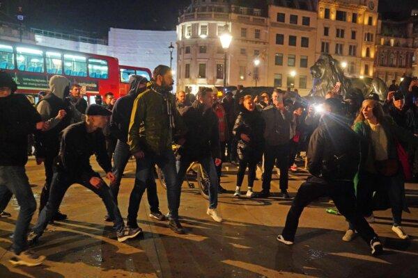 Counter-protesters (L) and pro-Palestinian protesters in Trafalgar Square in central London, after a pro-Palestinian protest march which was taking place from Hyde Park to the U.S. embassy in Vauxhall, on Nov. 11, 2023. (Victoria Jones/PA)